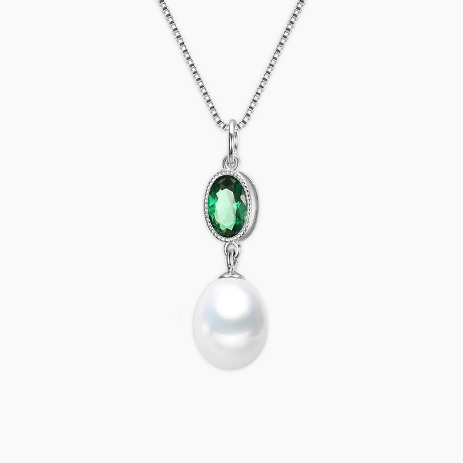pearl necklace with emerald in white background