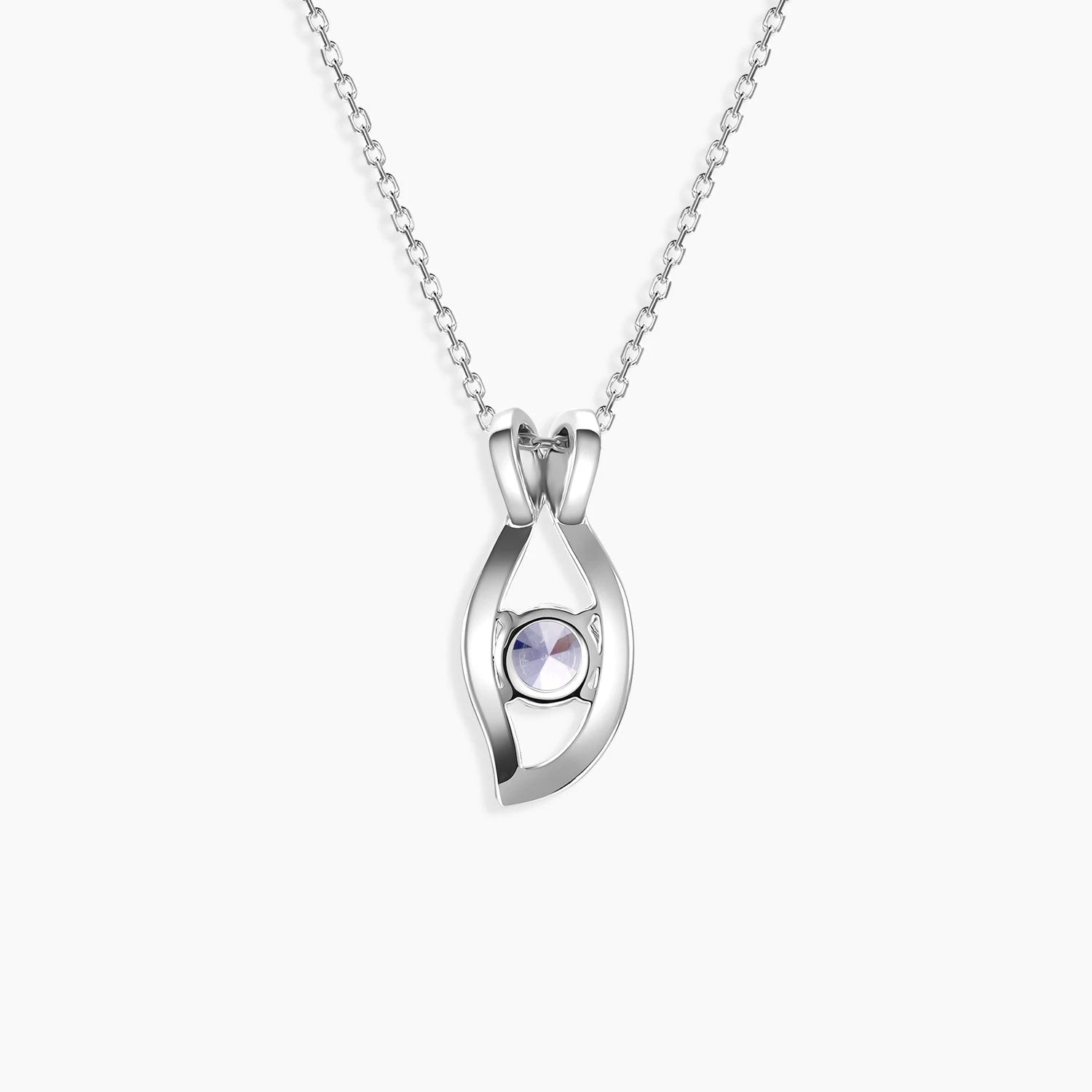 Back side view of alexandrite evil eye necklace in silver showing colour-shifting gemstone in sculpted setting