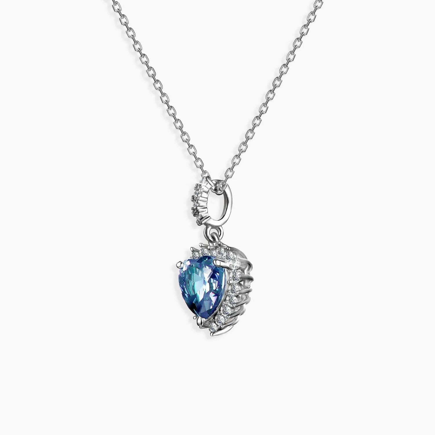 Alexandrite heart pendant on trace chain with shimmering halo accents in rhodium-plated silver