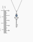 Alexandrite key pendant next to size chart – 3.5 cm height, 0.8 cm width