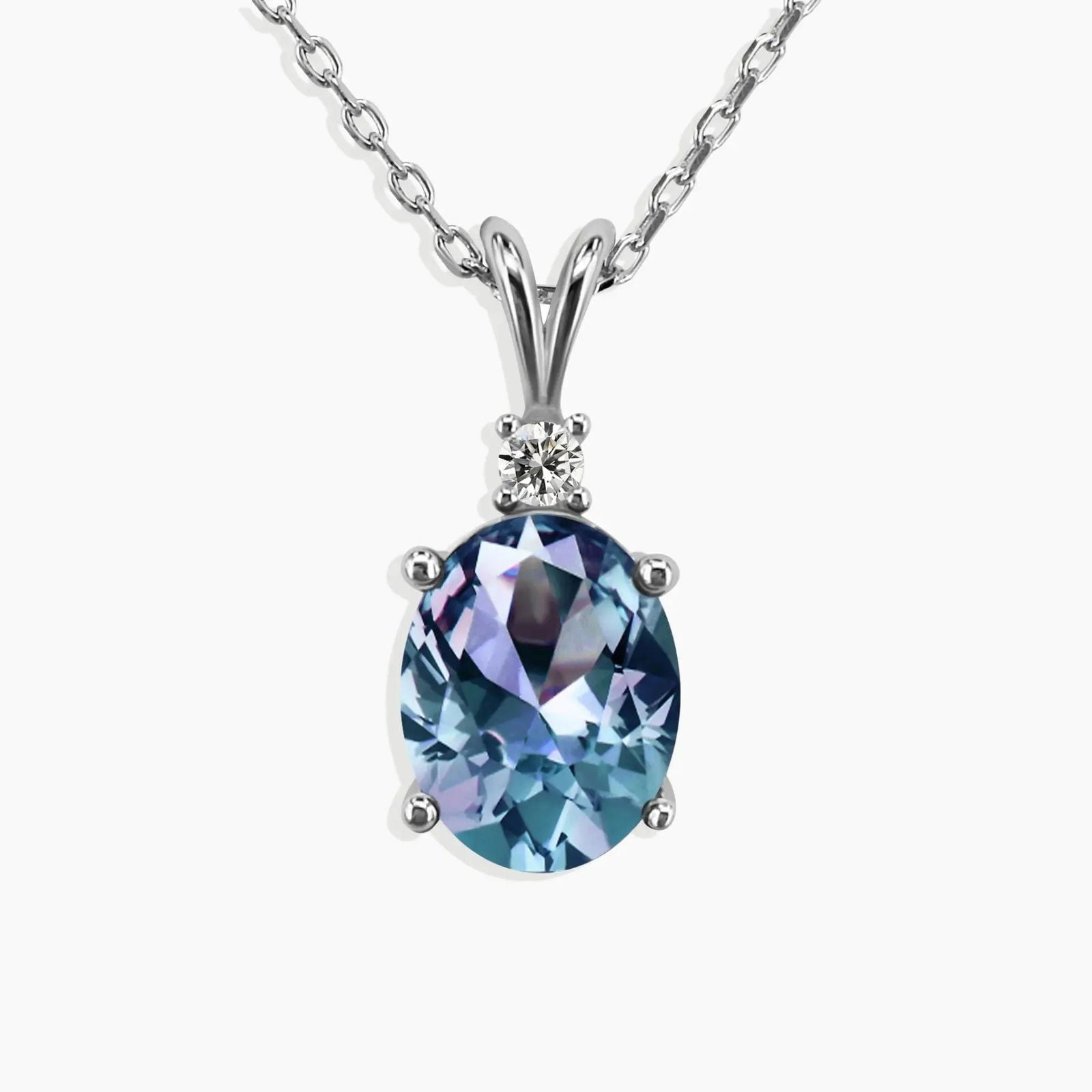 Alexandrite oval pendant necklace in sterling silver – 10x8 mm colour-changing gemstone with accent bail