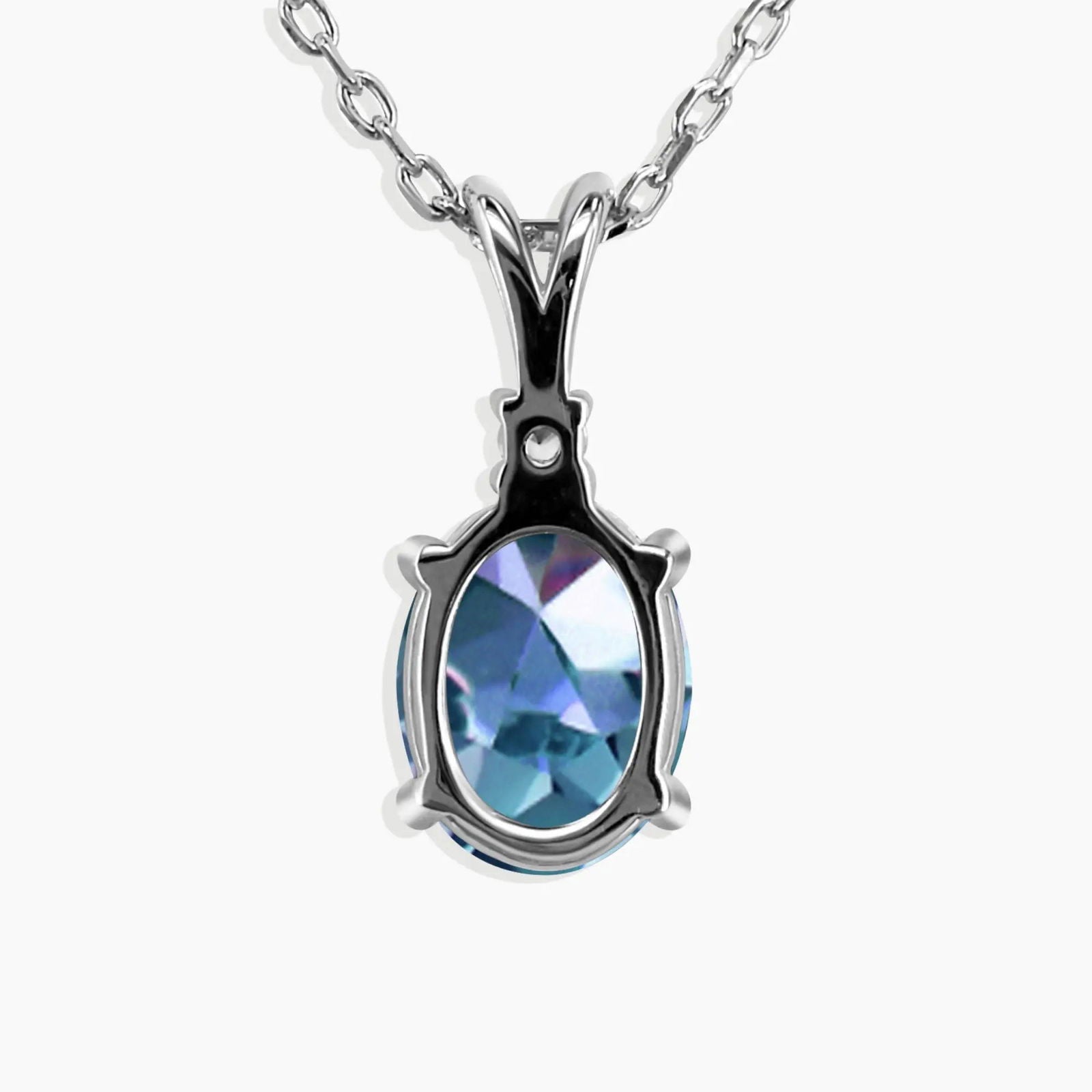 Alexandrite Oval Shape Pendant Necklace in Sterling Silver - IroskDetailed view of Alexandrite oval gemstone with prong setting and subtle accent above stone Australia