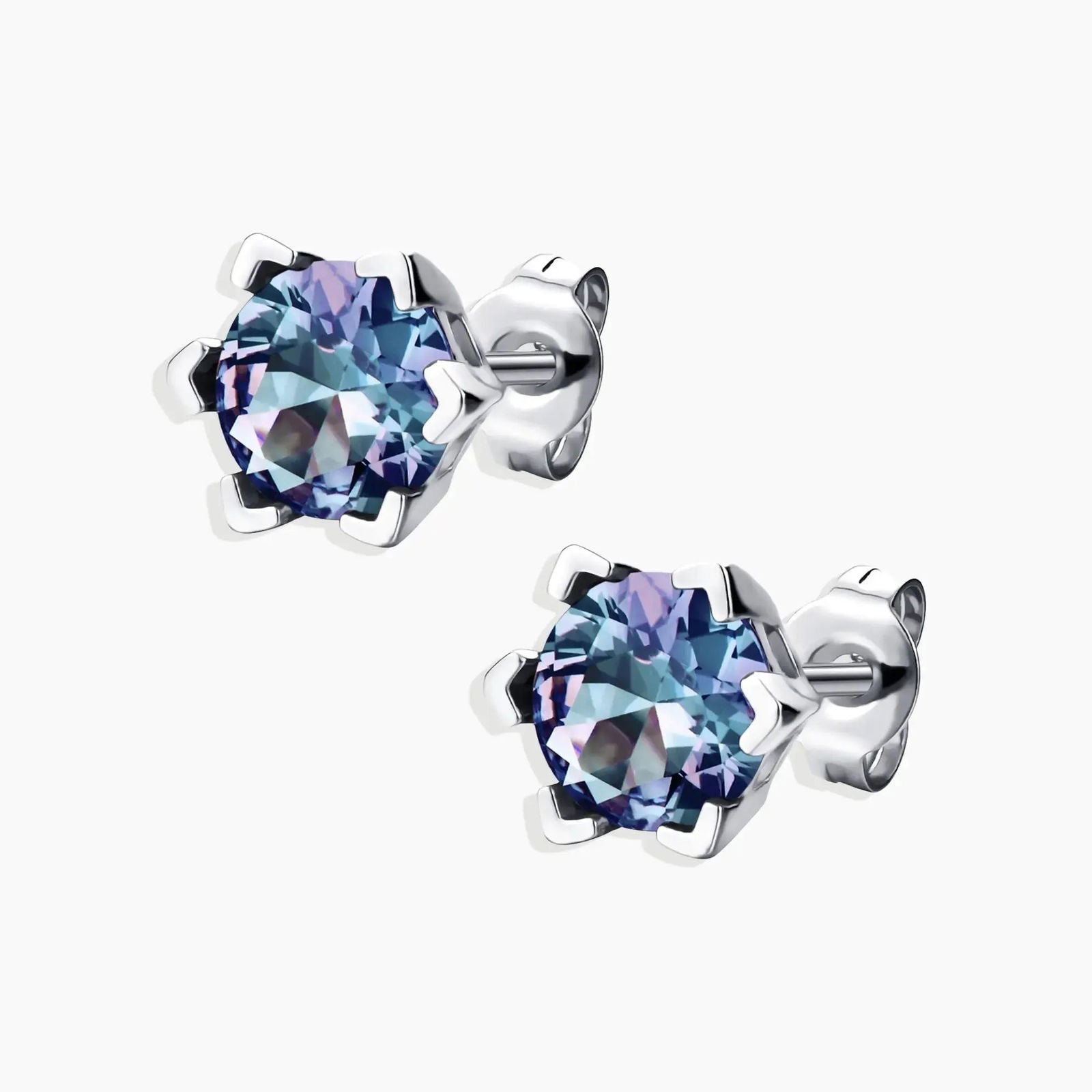 Side angle view of Alexandrite stud earrings in hexagonal bezel setting – elegant and modern