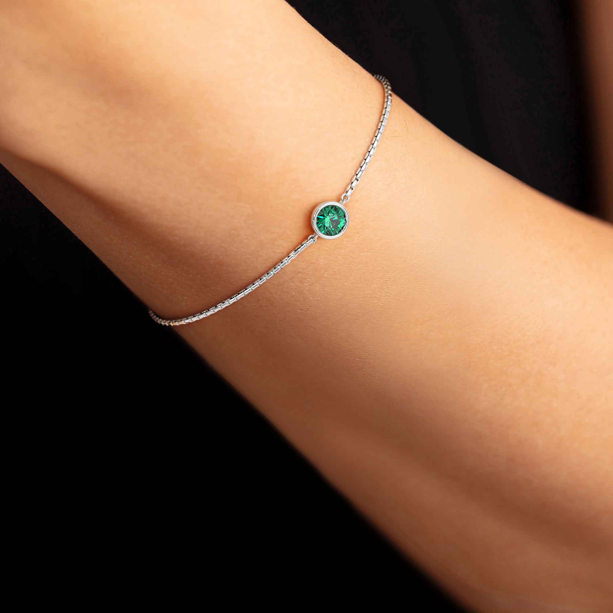emerald bracelet on model wrist