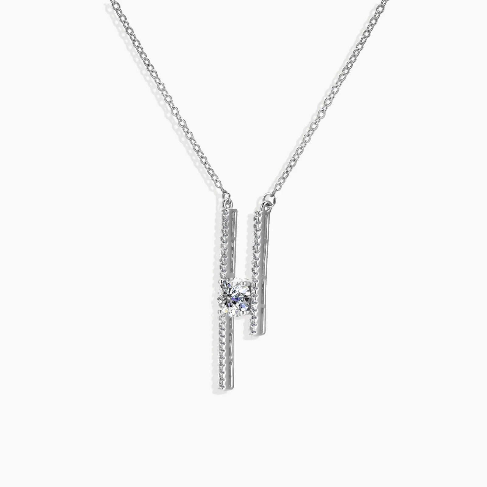 Angled close-up shot of the Moissanite Parallel Bars Pendant, showcasing the rhodium-plated finish and brilliant central gemstone.