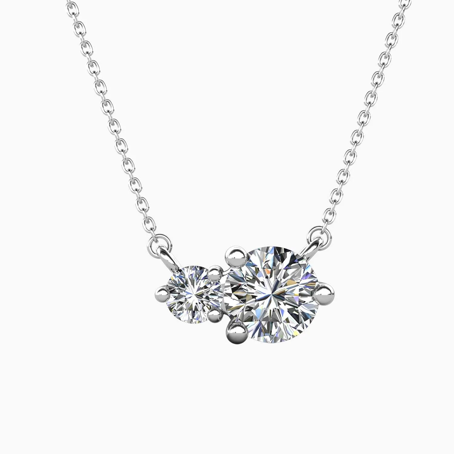 Moissanite Twin Pendant Necklace by Irosk Australia on a white background, featuring two brilliant stones in 925 Sterling Silver.