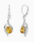 Oval shape citrine drop earrings in sterling silver with leverback closure