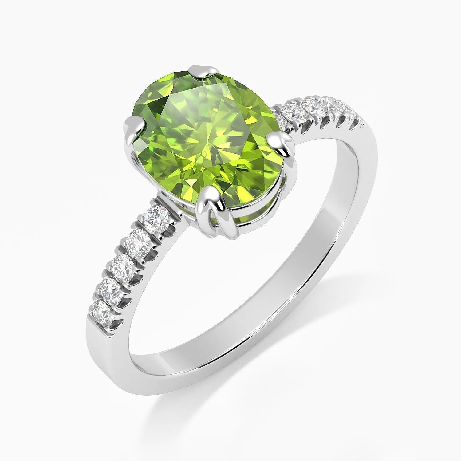 Side angle view of the oval peridot ring showcasing the detailed four-claw setting and polished silver band.