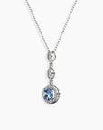 Alexandrite pendant necklace with colour-changing gemstone and sparkling accent stones on silver chain
