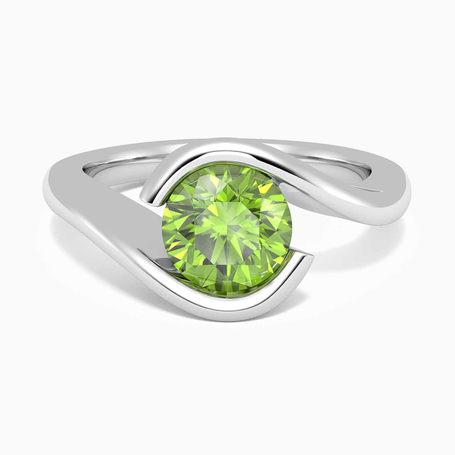 Close-up of round-cut peridot bezel ring in rhodium-plated sterling silver with minimalist band.