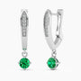 Sterling silver hoop earrings with a round emerald drop, displayed on a white background.