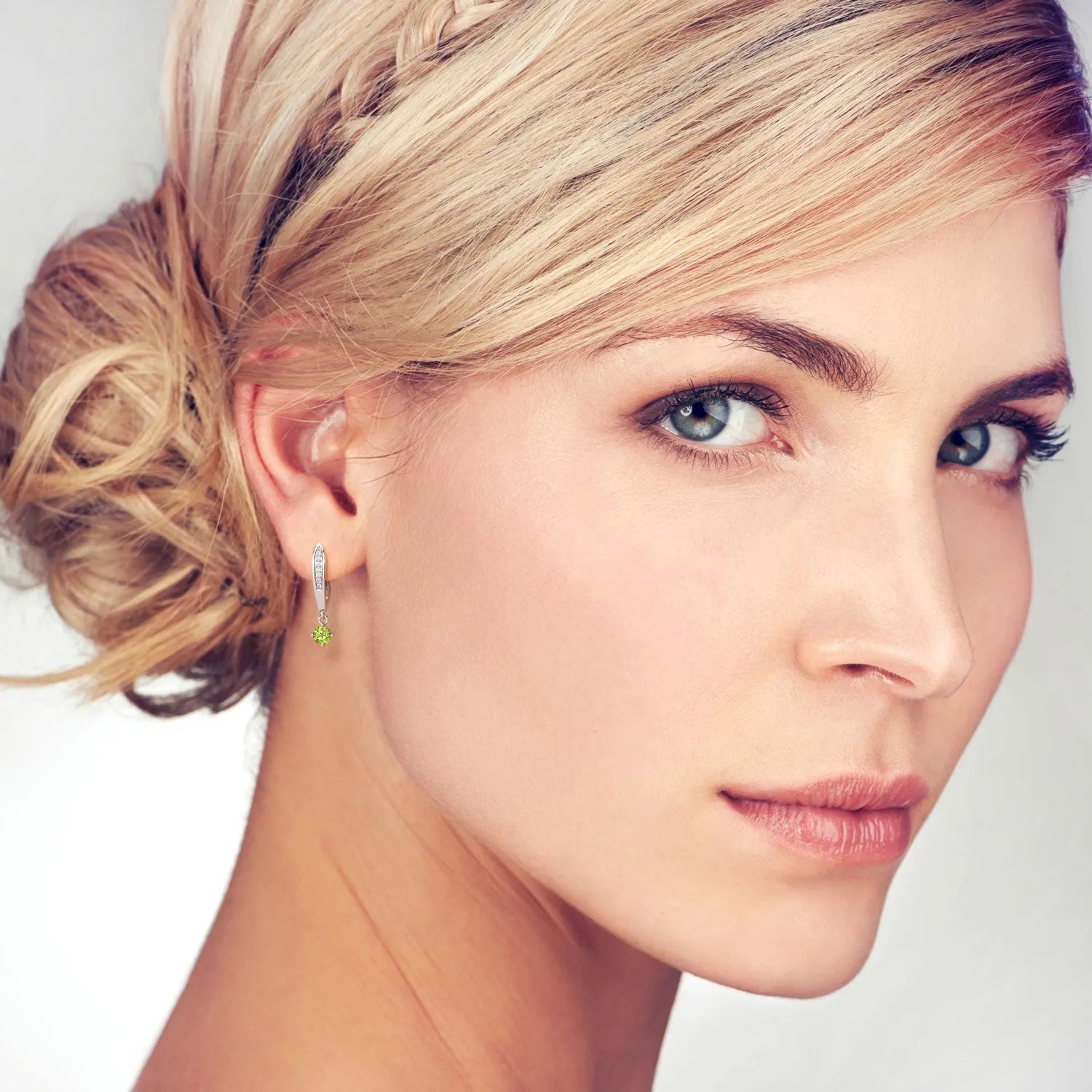 Model wearing Peridot Drop Earrings in Sterling Silver