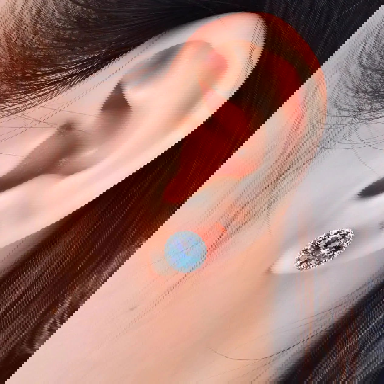 Alexandrite beaded edge stud earrings worn on ear – elegant June birthstone jewellery for daily wear