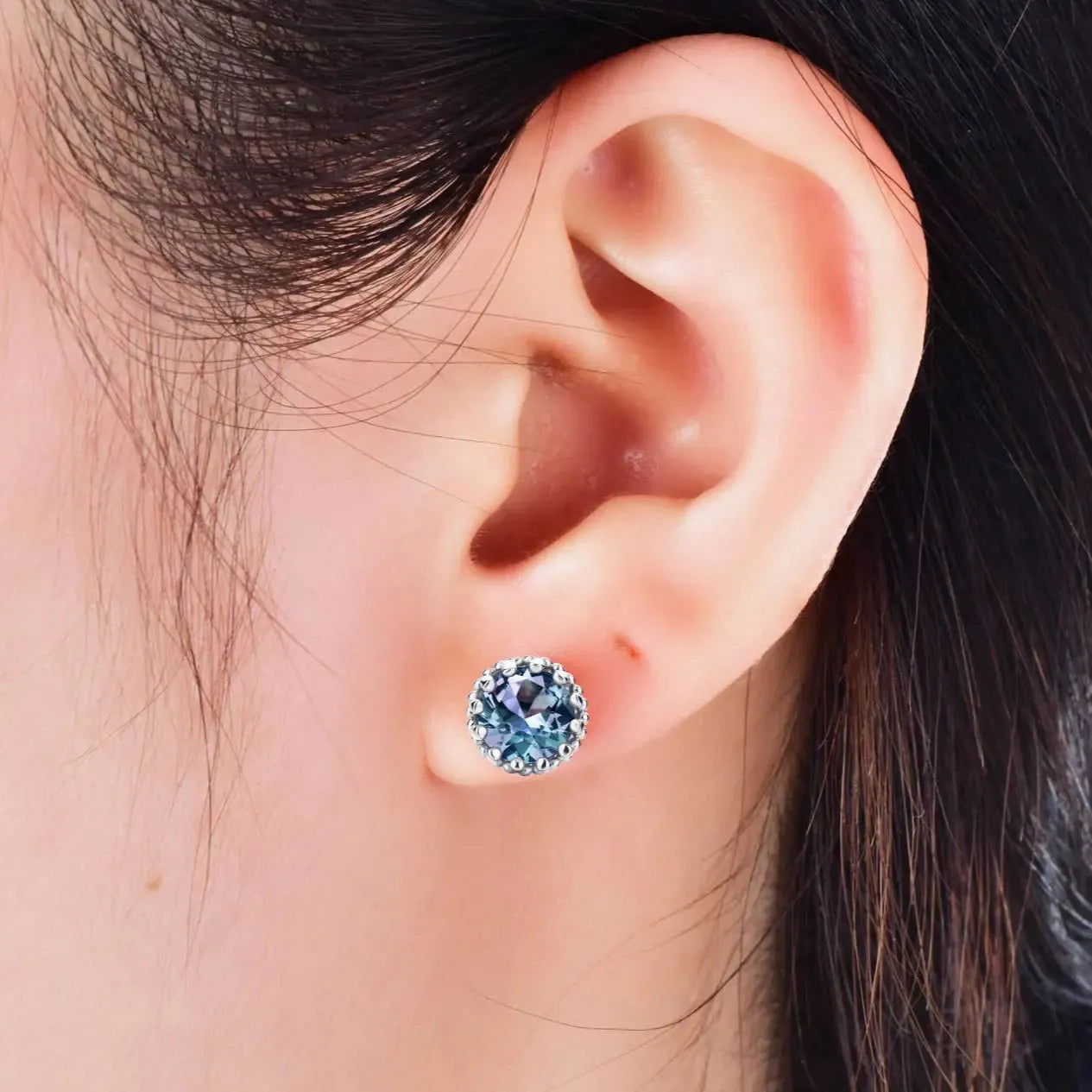Alexandrite beaded edge stud earrings worn on ear – elegant June birthstone jewellery for daily wear