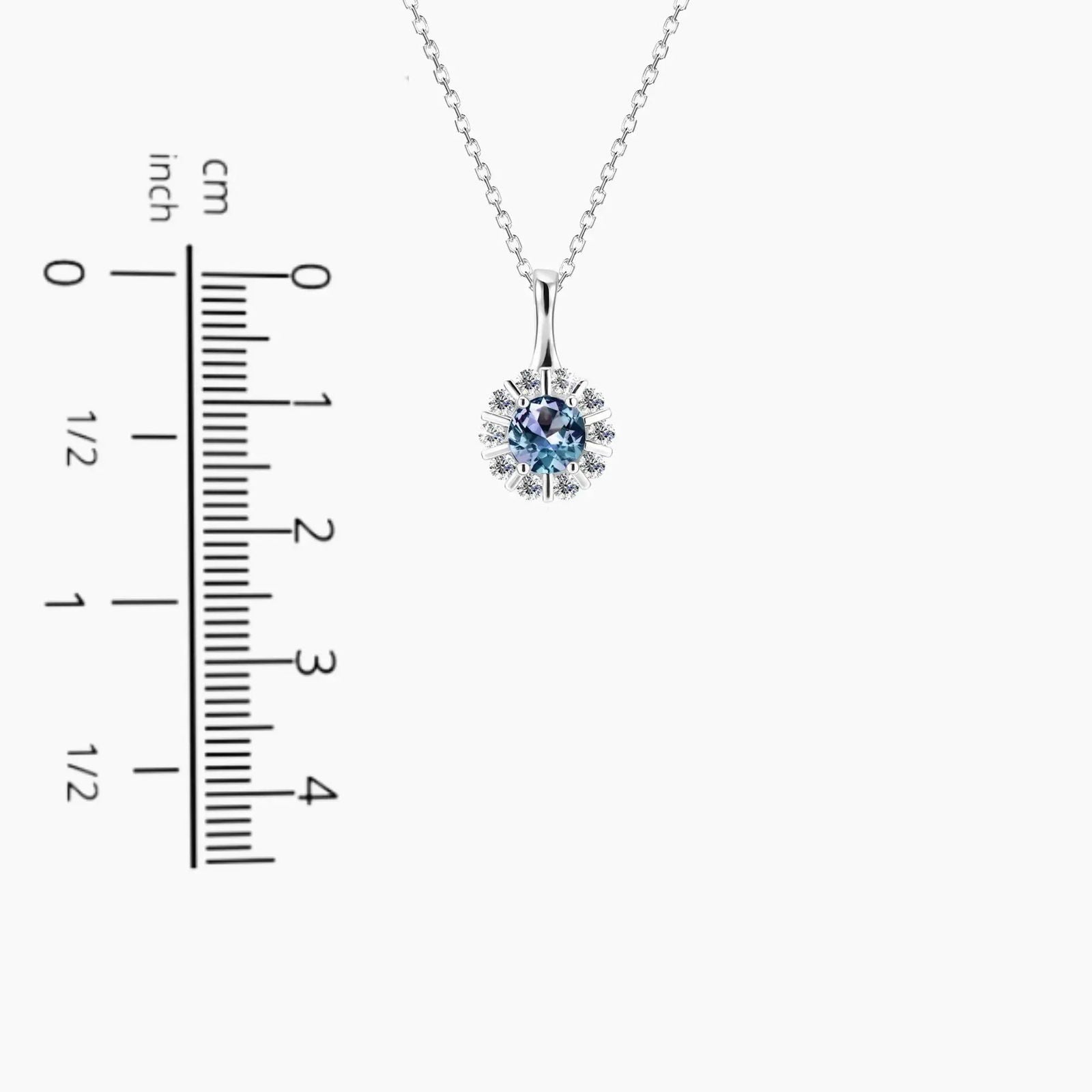 Alexandrite halo pendant shown with size reference – 1.8 cm height, 1.2 cm width