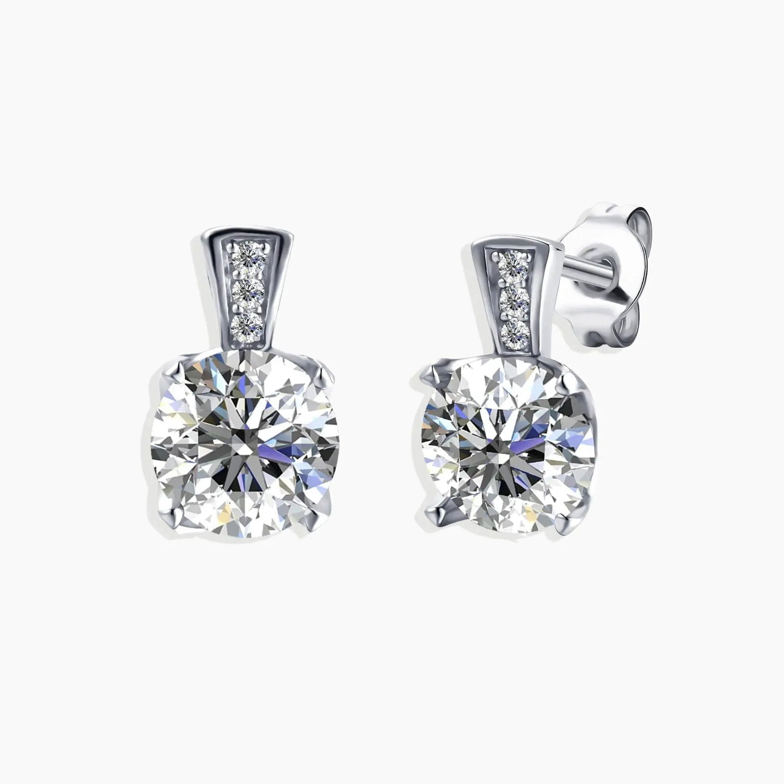 Pair of 1ct Scintillating Moissanite Stud Earrings in sterling silver, displayed against a white background.