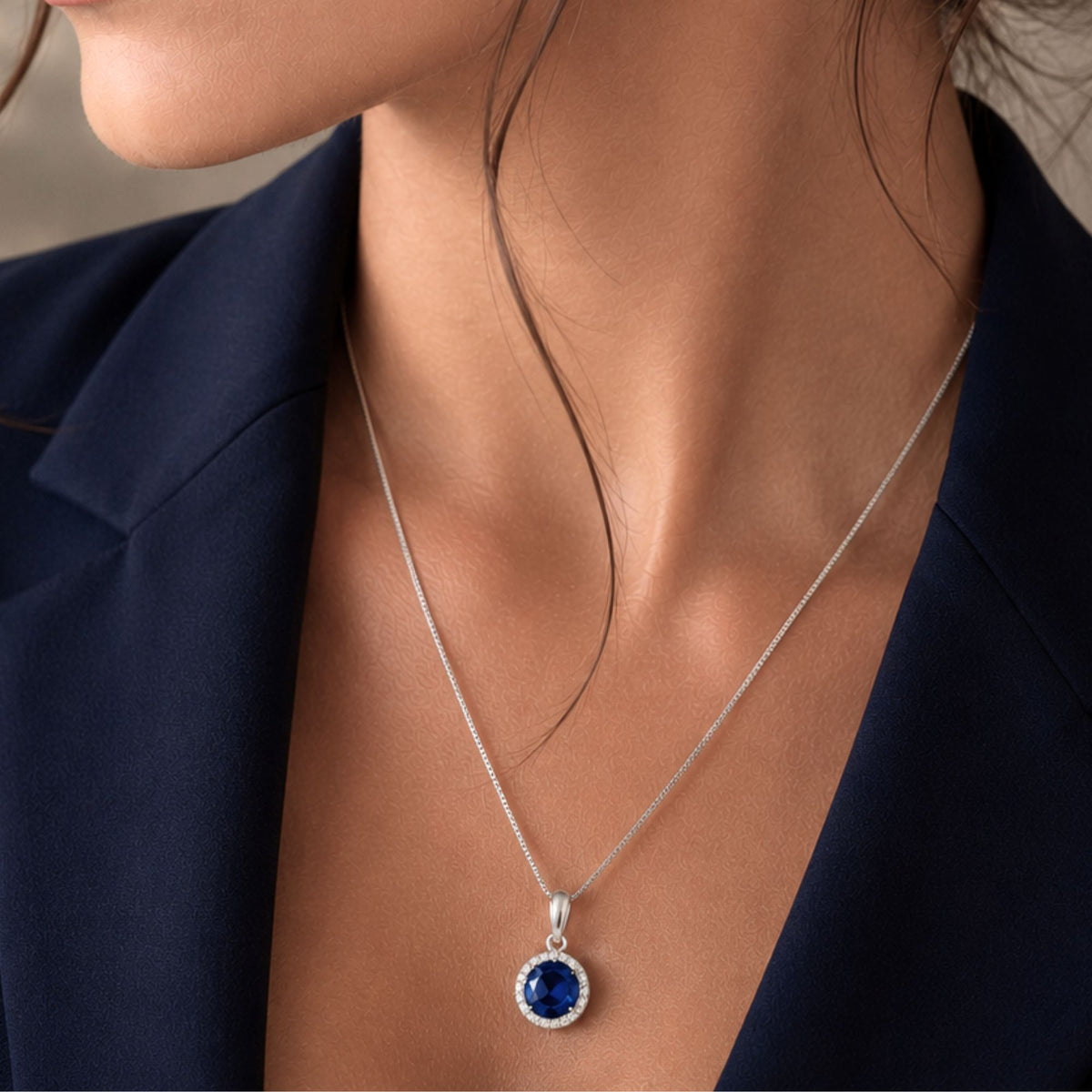 sapphire round halo pendant in sterling silver