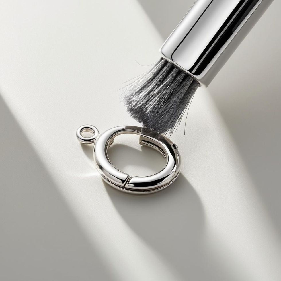 a sparkling clean latch of earrings with cleaning brush