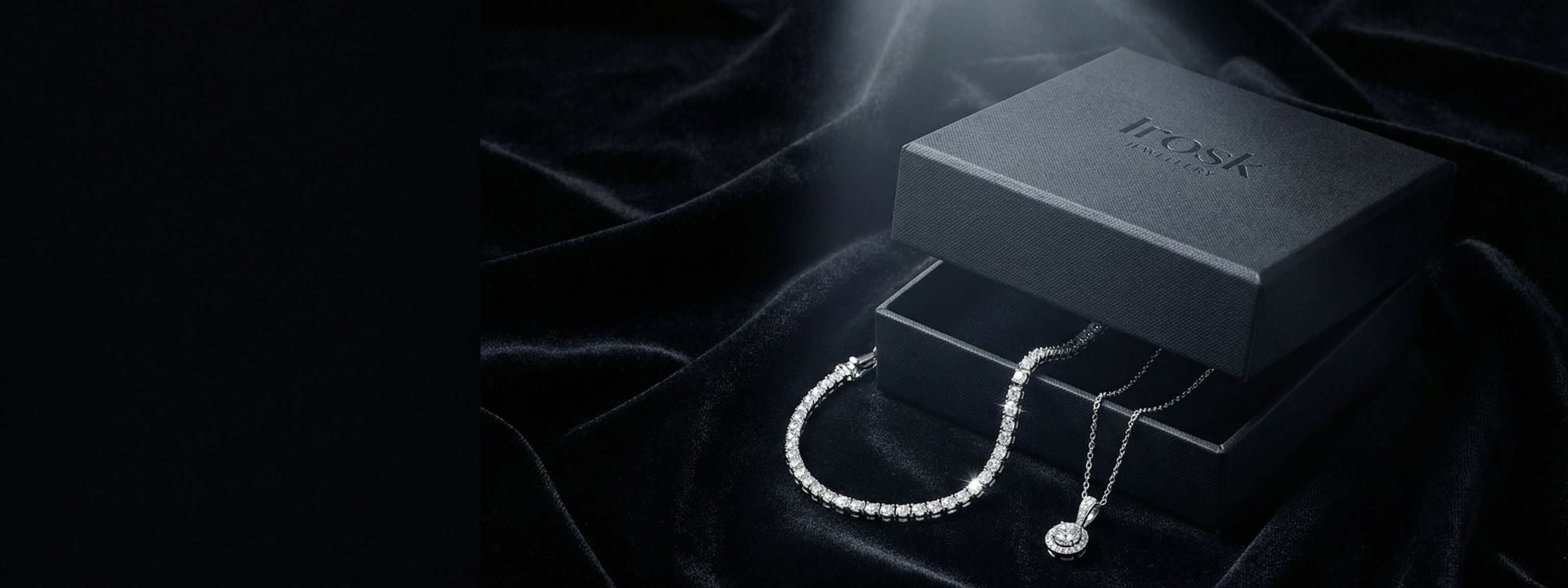 Pearl necklace on a branded jewelry box with a dark background