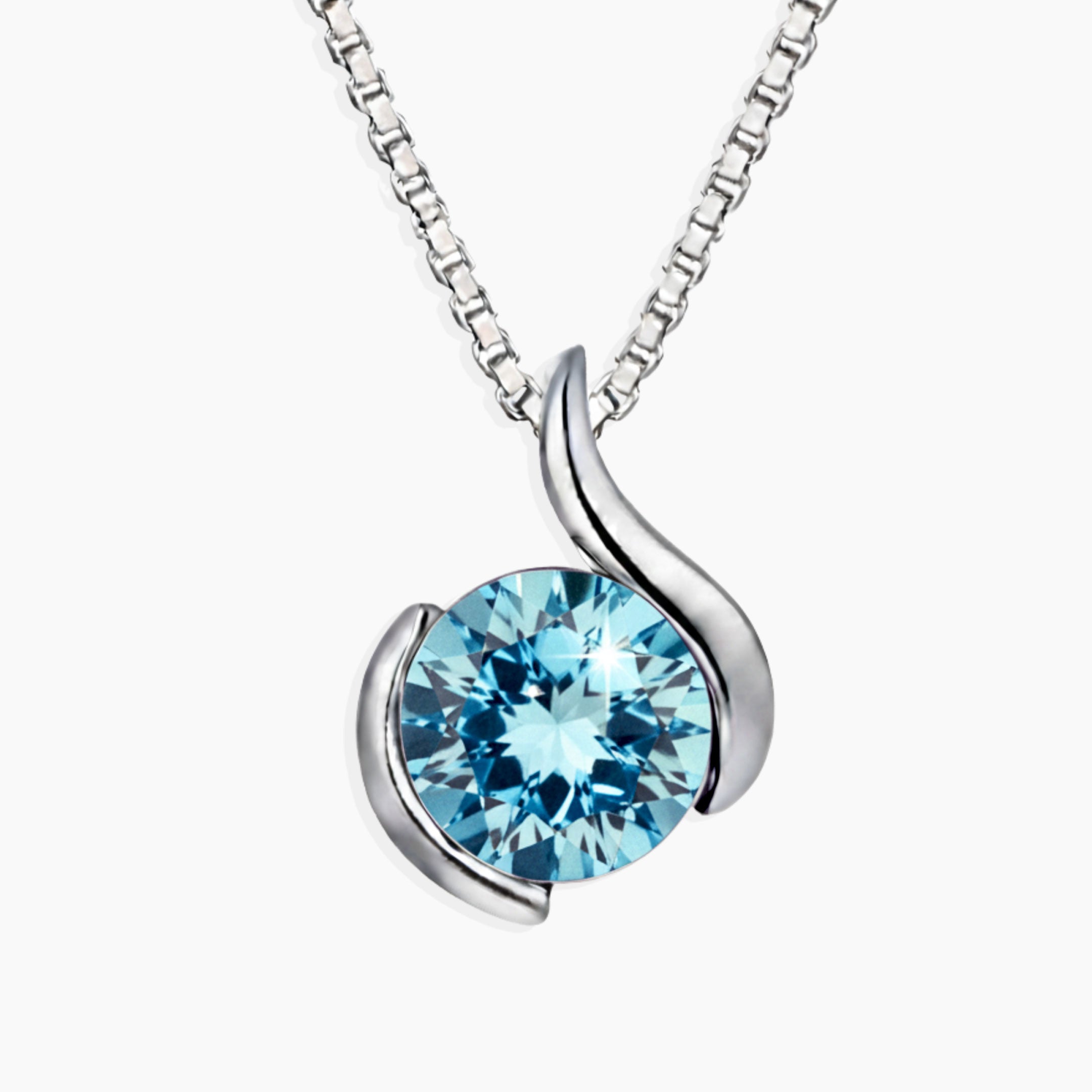 Silver necklace with a blue aquamarine gemstone pendant on a white background