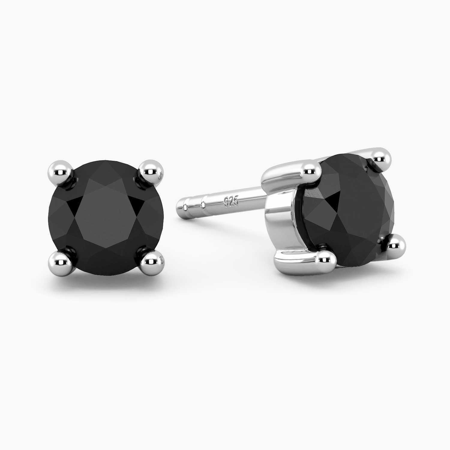 A pair of round shape stud earrings with black onyx gemstones set in sterling silver.