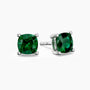 Cushion-cut emerald stud earrings in sterling silver, showcasing vibrant green gemstones held by a classic four-prong setting.