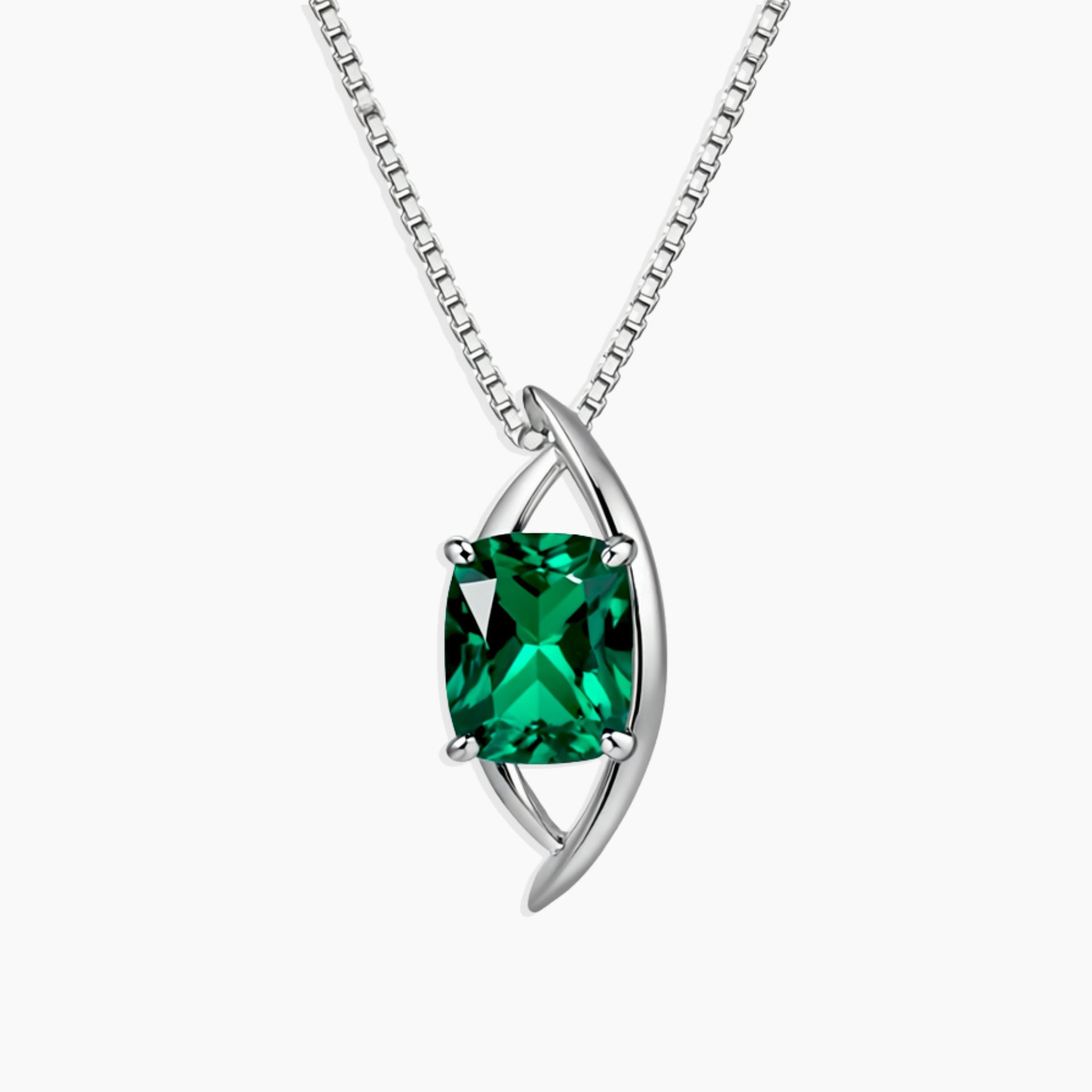 Sterling silver globe-style pendant necklace featuring a cushion-cut lab-created emerald on a fine box chain.