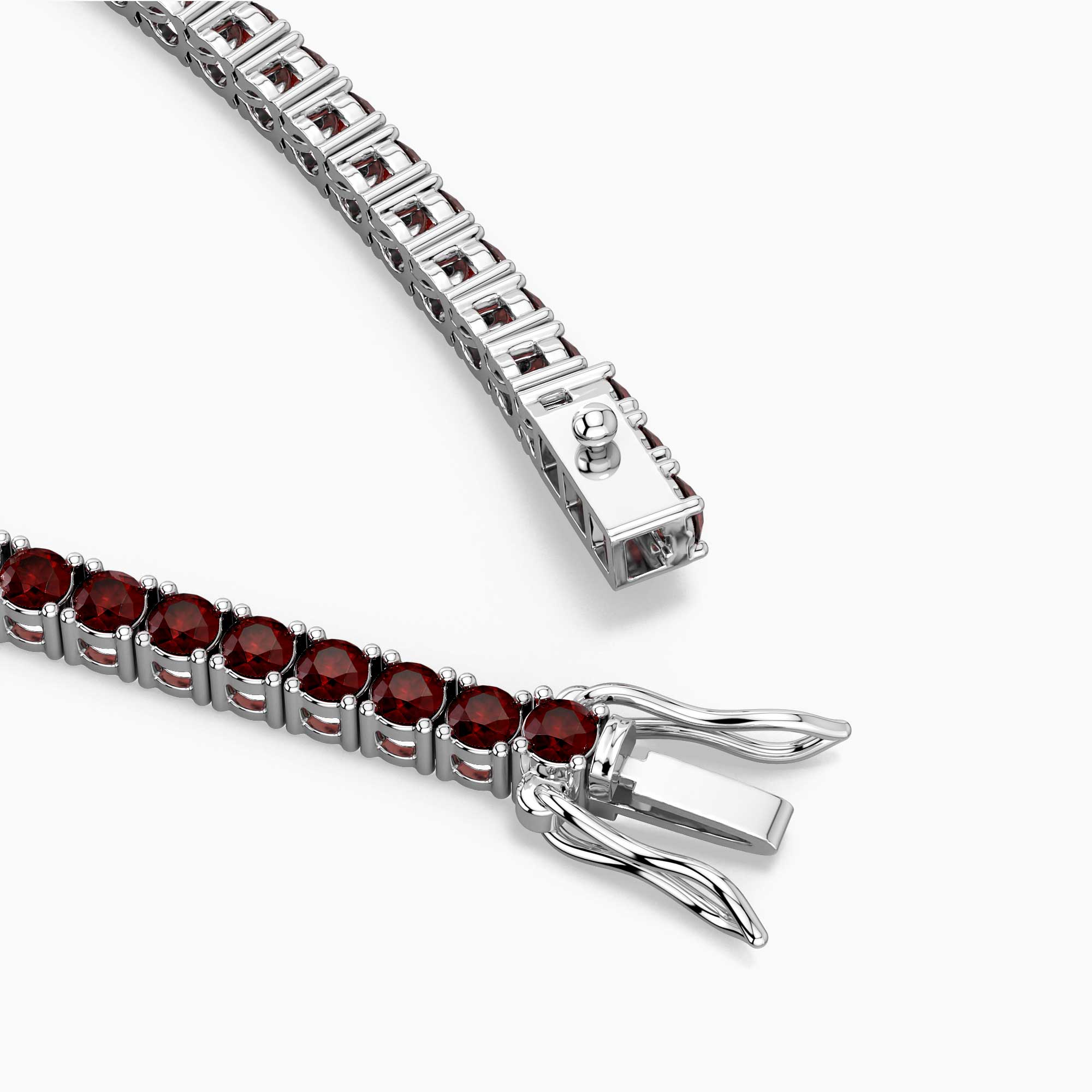 Silver bracelet with red gemstones on a white background