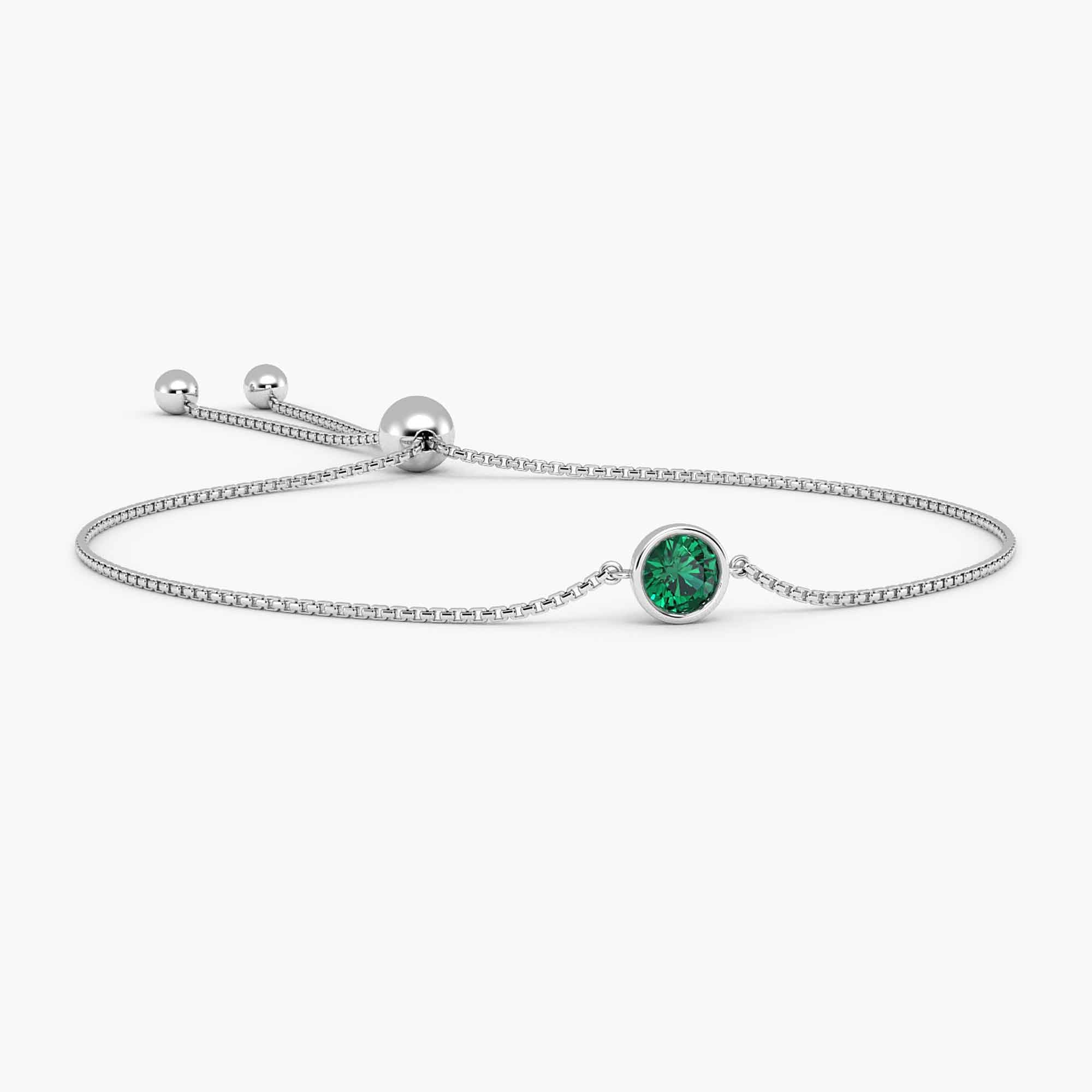 lab emerald bracelet in white background