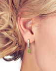 peridot earrings on model