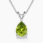 Elegant pear-shaped peridot pendant in sterling silver on a fine box chain.
