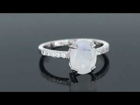 Rotating close-up video of the Irosk moonstone ring highlighting its gemstone glow and detailed side accents.