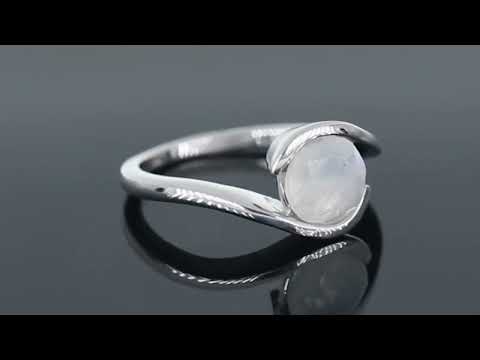 Video preview of the moonstone semi bezel ring rotating to display its shimmer and unique open band design