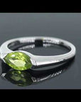 Video showcasing Peridot Gemstone Ring with Marquise Cut in Silver