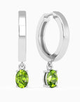 peridot hoop earrings in silver