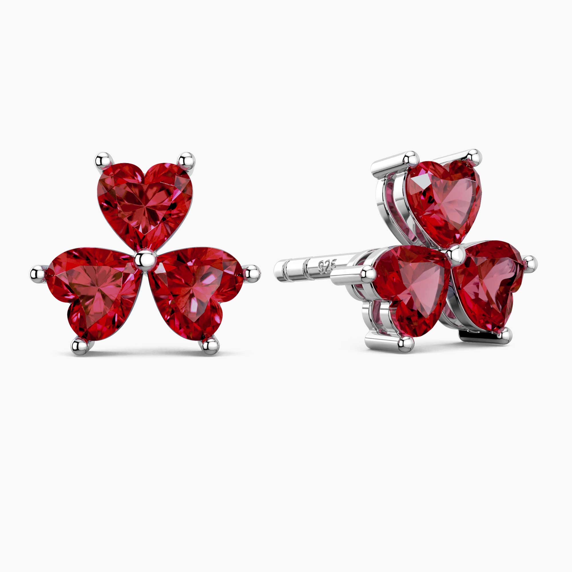 Red heart-shaped stud earrings on a white background