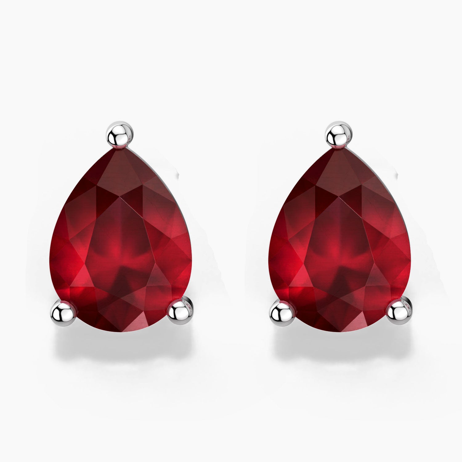 Ruby pear stud earrings in silver – front view.