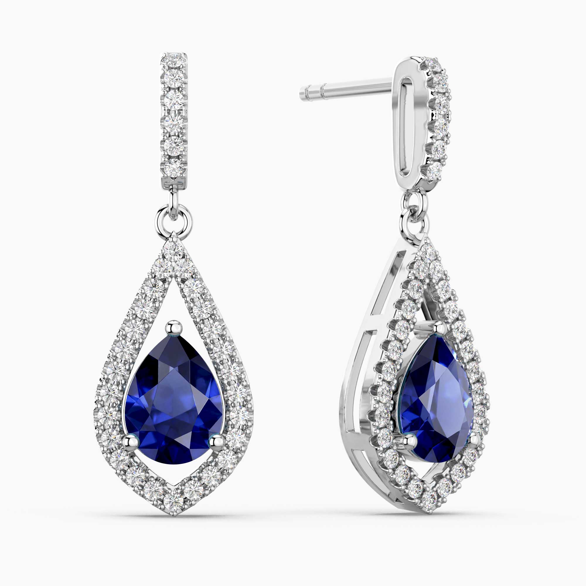 Teardrop-shaped sapphire earrings with diamond accents on a white background