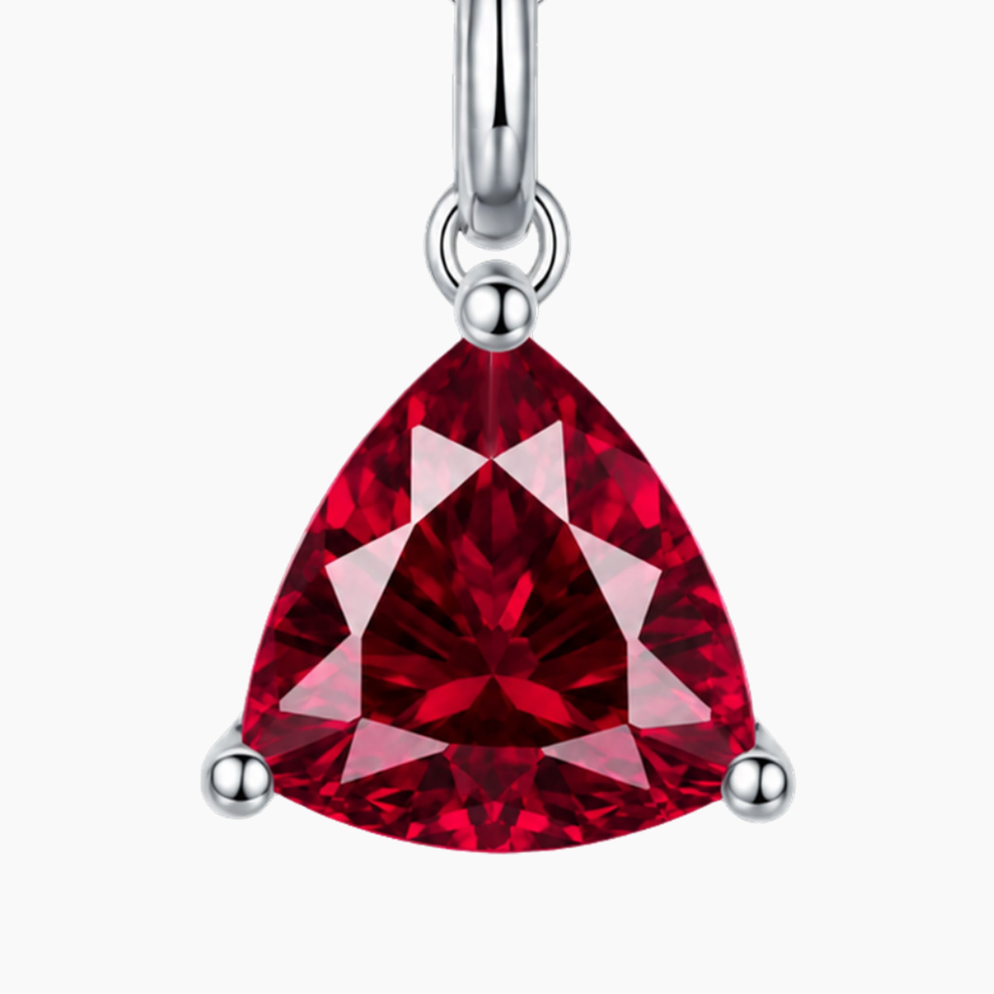 Trillion-cut red gemstone pendant on a white background