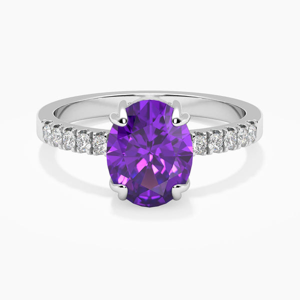 Front view of Elegant Oval Shape Amethyst Ring, showcasing a stunning oval-cut amethyst stone surrounded by a halo on the shank, crafted in sterling silver.