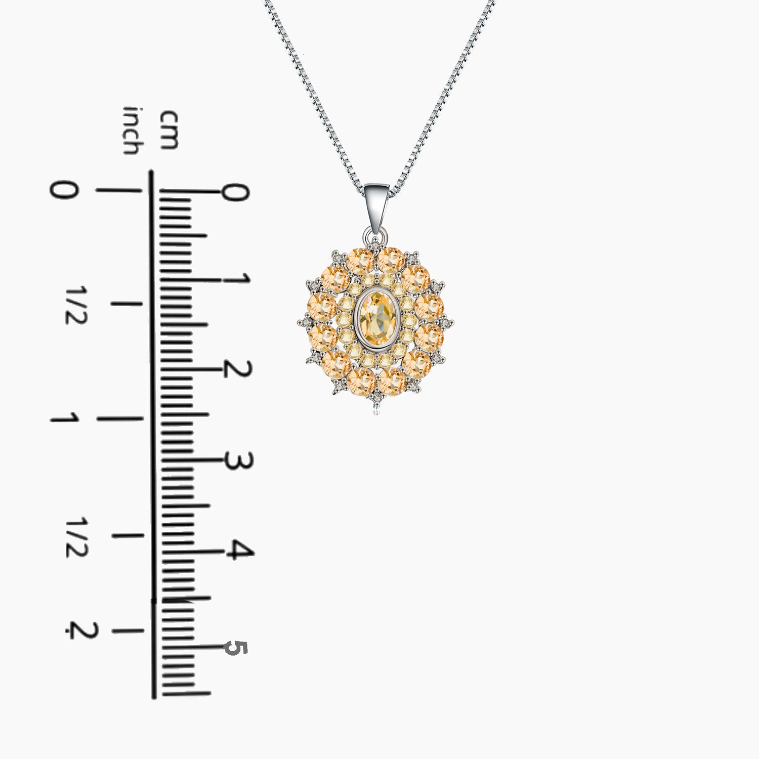 Citrine Crown Pendant in Sterling Silver - Scale image showing pendant size relative to a ruler or coin for accurate measurement reference
