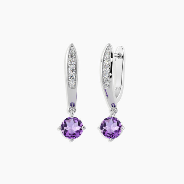 Sterling silver earrings with dangling amethyst stones