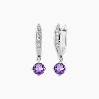 Sterling silver earrings with dangling amethyst stones