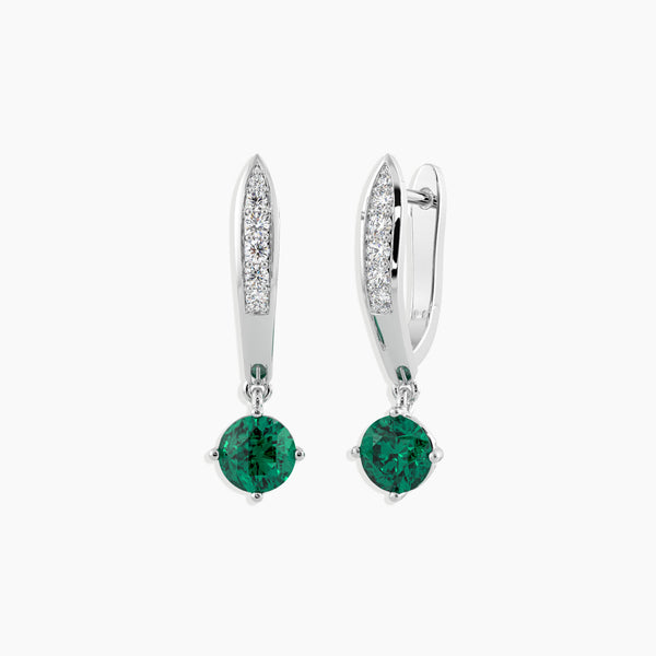 Front view of silver emerald Mia dangling earrings