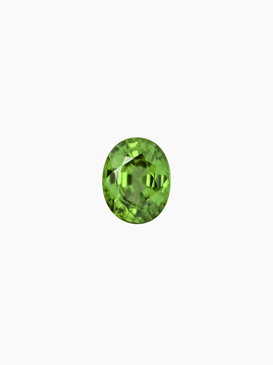 vibrant oval shape green peridot with white background representing august birthstone