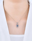 Alexandrite evil eye necklace worn on model – elegant and symbolic birthstone jewellery for women