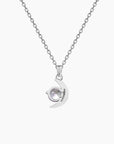Back side Silver moon-shaped necklace with Alexandrite gemstone on trace chain – June birthstone gift