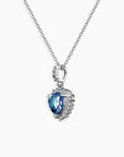 Alexandrite heart pendant on trace chain with shimmering halo accents in rhodium-plated silver