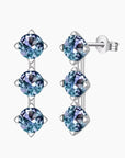 Three-stone Alexandrite stud earrings in sterling silver – vertical drop design with colour-changing gems
