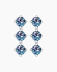 Front view of designer-inspired Alexandrite earrings with vertical trio of round gemstone